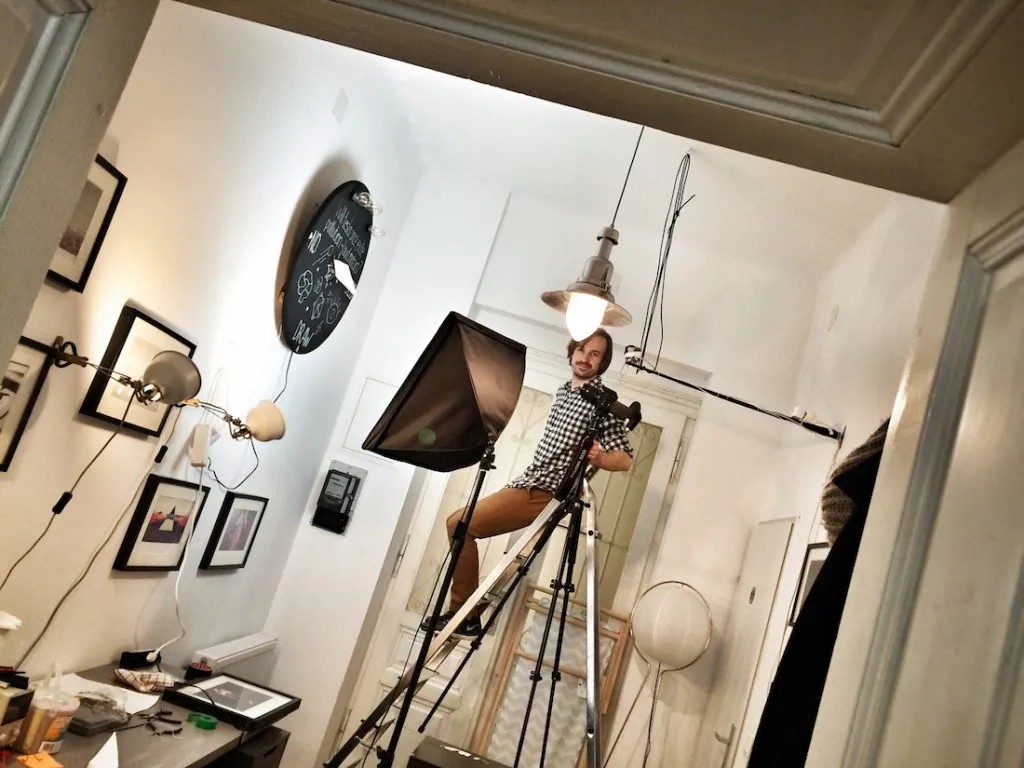 Christoph standing on ladder in the Liechtenecker Lab
